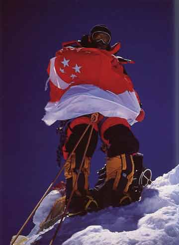 
Edwin Siew Holding Singapore's National Flag On Shishapangma Central Summit May 16, 2002 - Xixabangma An Alpine Ascent of the North Ridge book
